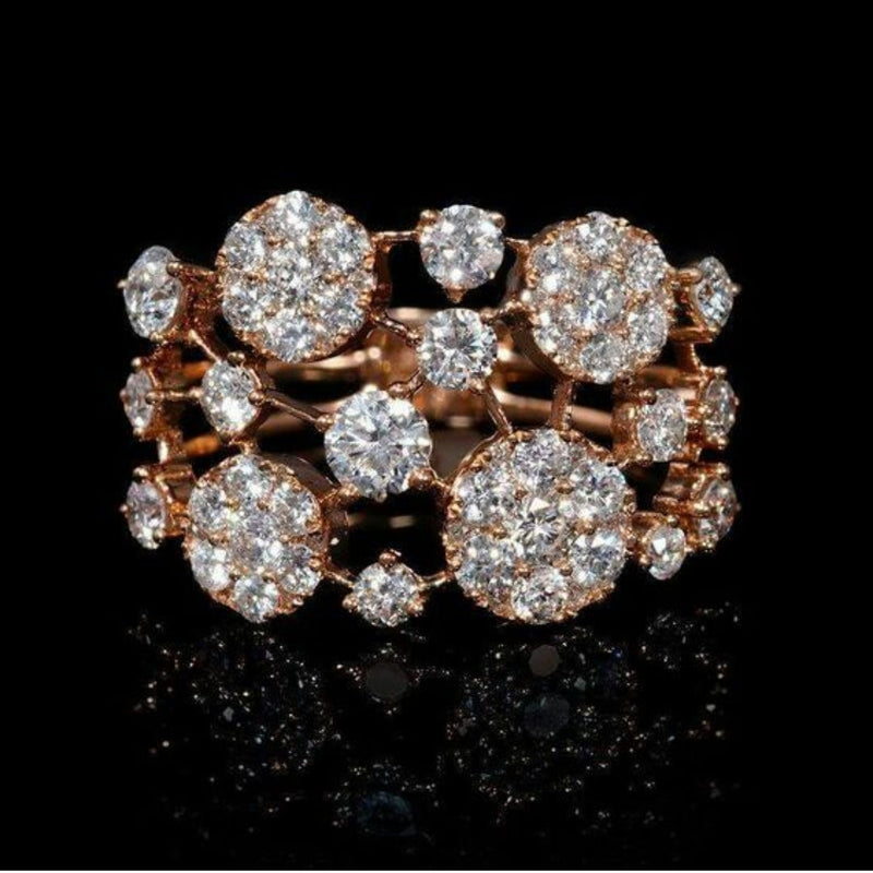 Antik ring i rosa guld med glitrende sten