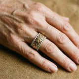 Spleciony retro-guld ring med zirkon
